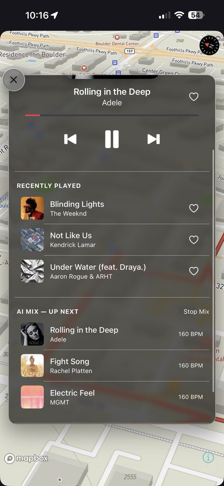 An AI-built mix queued up in Kardiacs, each track matched to the interval's cadence in BPM